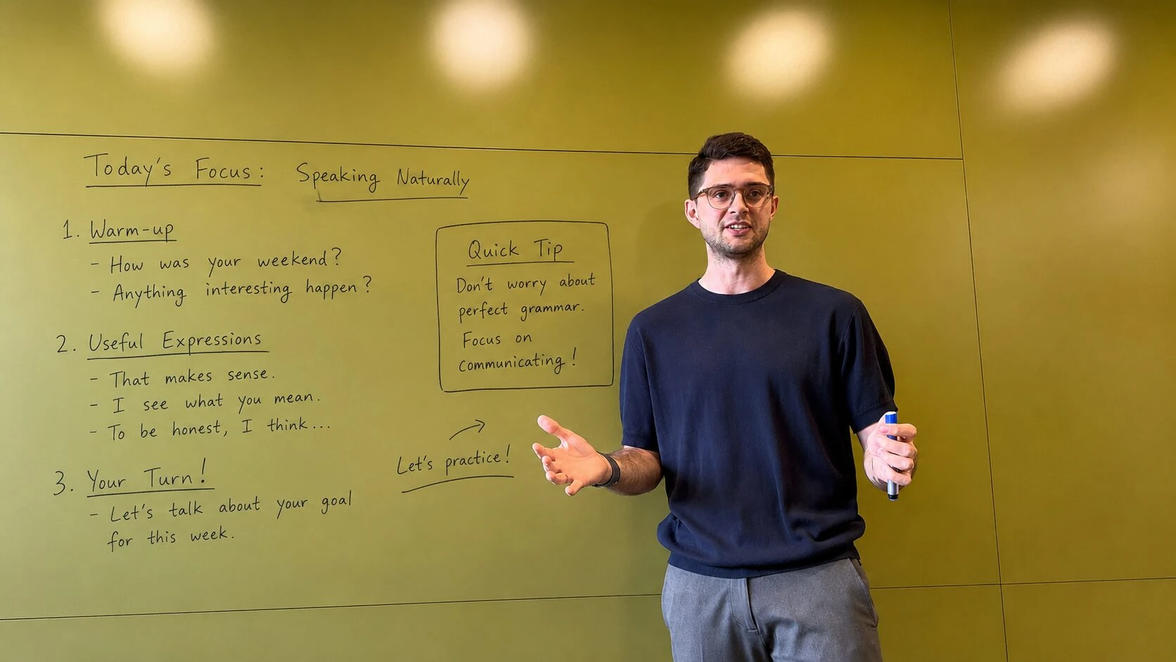 Quintin, a certified English teacher, leading a speaking lesson at the whiteboard in Seoul.