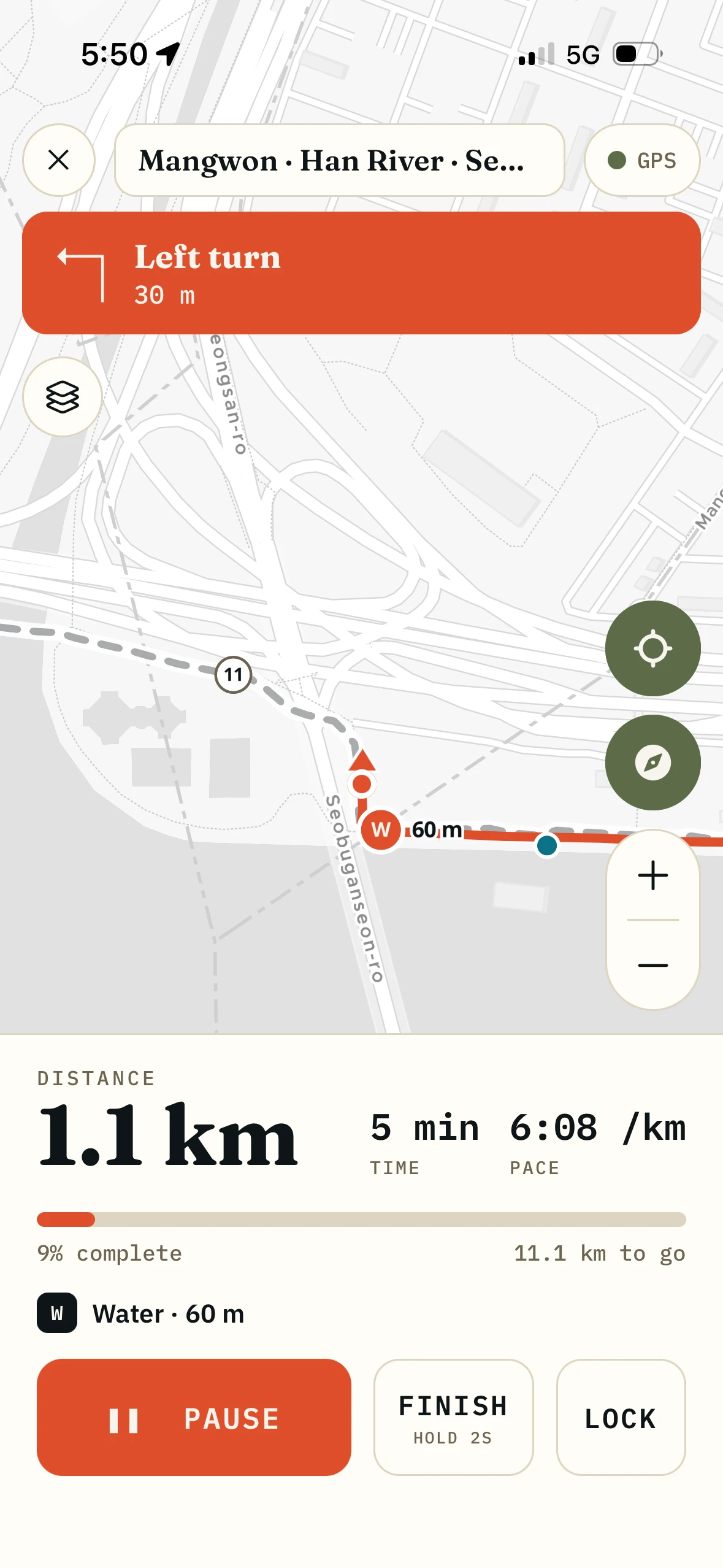 The run screen showing an urgent left turn 30 metres ahead above the distance, time, pace and route progress